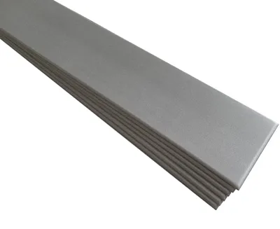A stack of grey decorative foam panels.
