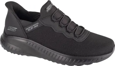 A black Skechers slip-on shoe is shown from the side against a white background.
