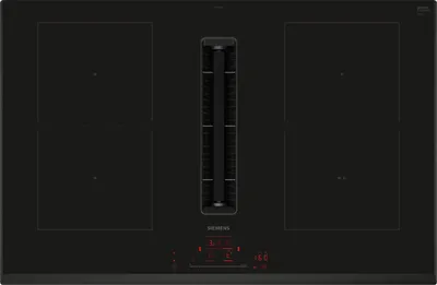 A top-down view of a black induction cooktop with an integrated downdraft ventilation system.