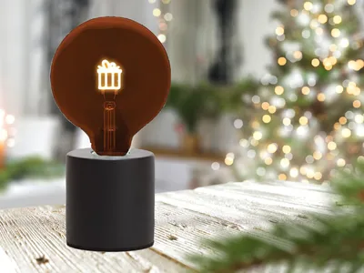Produktbild von Kleine Tischlampe Beton Schwarz Ø 9cm mit Deko LED Glühbirne Geschenkpaket Gold