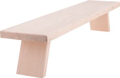 A light-colored wooden bench with two angled supports.