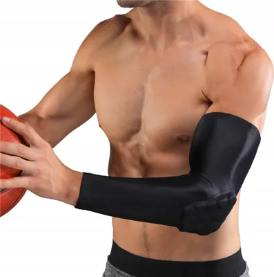 A man is holding a basketball and wearing a black elbow sleeve.