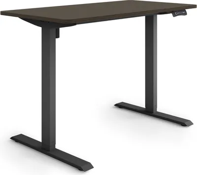 A modern, adjustable standing desk with a dark wood-effect top and dark gray metal legs, shown against a plain white background.