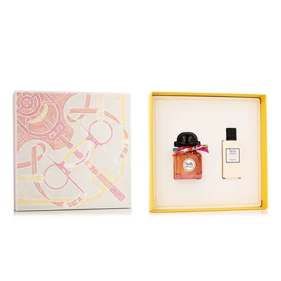 A gift set of Hermès perfume and lotion, presented in its original packaging.