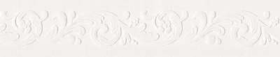 A close-up of a white embossed border pattern.