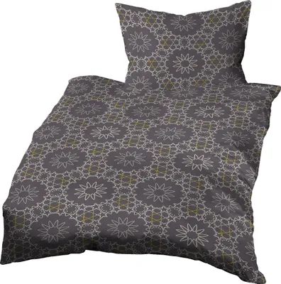 A duvet cover and pillow with a geometric pattern.