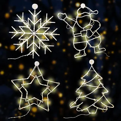 Four different Christmas-themed LED light decorations (snowflake, Santa, star, Christmas tree) against a dark, bokeh-effect background.