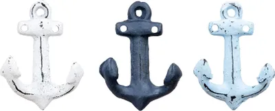 Three cast iron anchors in different colors arranged side-by-side.