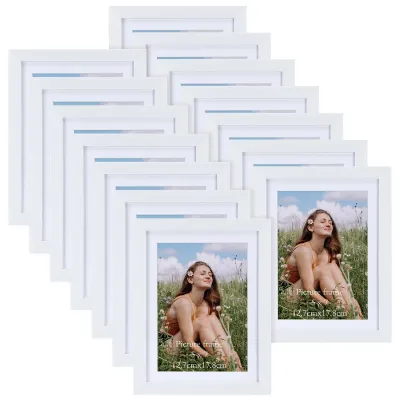 Immagine prodotto di Set di cornici per foto, 15 pezzi, 15 x 20 cm, con cornice in MDF bianco, ideale per decorare le pareti