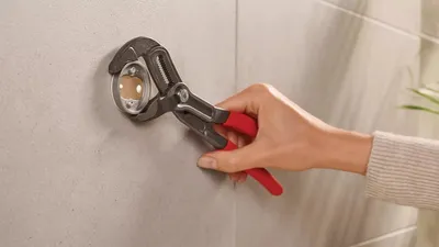 Produktbild von Toilettenrollenhalter Moon White inkl. Klebelösung Packung mit 16 Stück