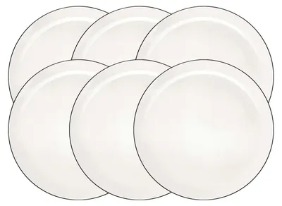 A set of six white plates arranged in a staggered pattern.