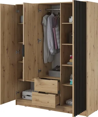 An open wardrobe with clothes hanging inside and drawers visible.