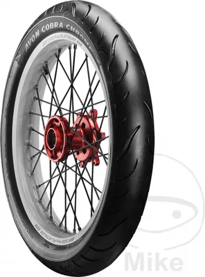 A close-up of a motorcycle tire mounted on a spoked wheel with a red hub.