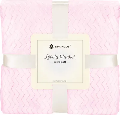 A folded pink blanket with a decorative zigzag pattern, tied with a white ribbon and a product tag.