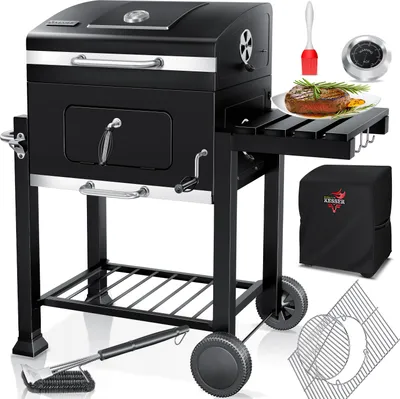 A black charcoal grill with accessories displayed around it.