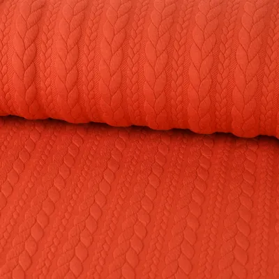 Produktbild von Bekleidungsstoff Meterware Cably Zopfmuster einfarbig dunkelorange