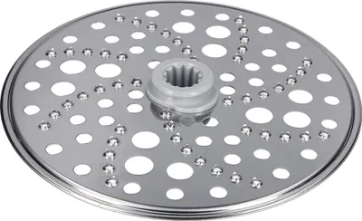 A close-up, isolated shot of a food processor grating disc.