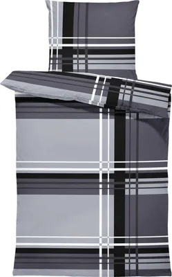 A folded duvet cover and pillowcase with a plaid pattern.