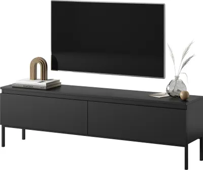A modern black TV stand with a flat-screen TV on top and decorative items.