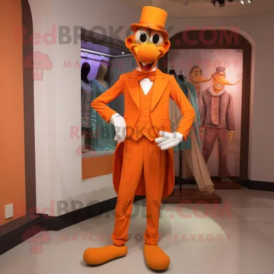 Produktbild von Orange REDBROKOLY Stelzenläufer Maskottchen Kostüm figur bekleidet mit Bermuda-Shorts und Fliege