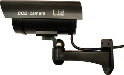 A black dummy security camera with a mounting bracket is shown against a white background.