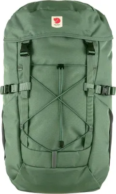 A green Fjällräven rucksack is shown from the front against a white background.