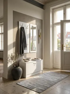 Moderne Flur-Kompaktgarderobe aus weißer Spanplatte mit Spiegel im minimalistischen Eingangsbereich auf edlem Natursteinboden_#sku_SAFWL5.166#