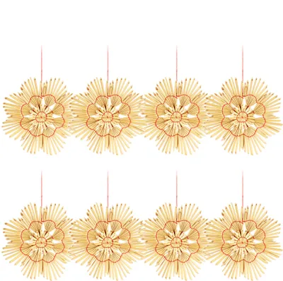 Eight straw stars are arranged in two rows of four against a white background.