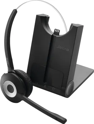 A black Jabra wireless headset and its charging base are shown against a white background.
