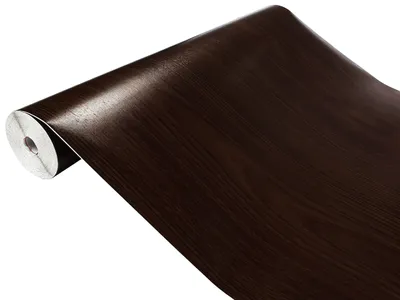 A roll of dark brown wood-grain contact paper.
