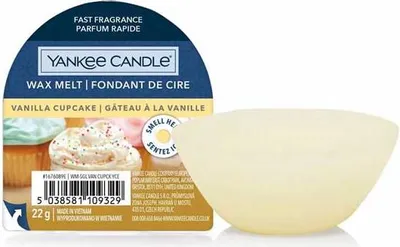 A Yankee Candle wax melt in its packaging, with the wax melt itself shown separately.