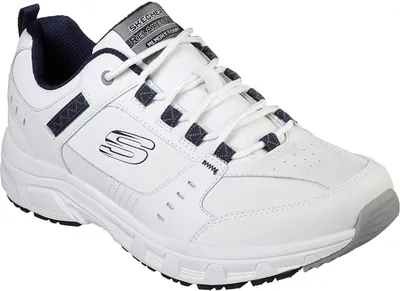A white athletic shoe with navy accents.