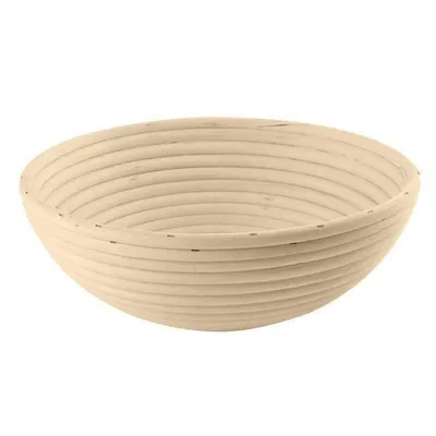A close-up view of a round, woven basket.