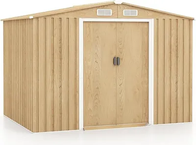 A light brown, wooden-style shed with double doors and vents on the roof.