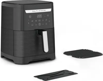A black air fryer with its accessories is displayed on a white background.