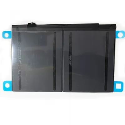 A black battery pack with blue tabs on a white background.