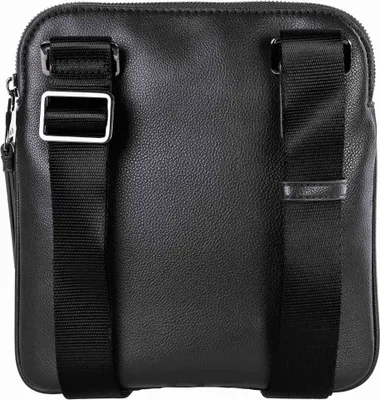 The back of a black crossbody bag with adjustable straps.