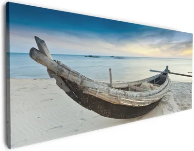 Produktbild von Wallario Premium Leinwandbild Fischerboot am Strand mit Sonnenuntergang in Größe 80 x 200 cm