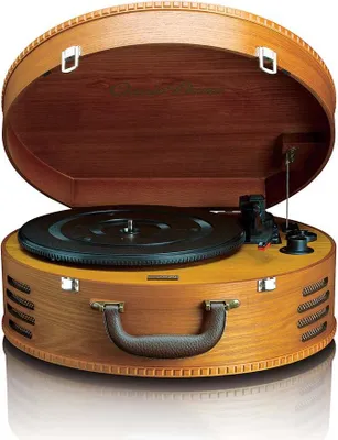 A retro-style suitcase record player is shown with its lid open.