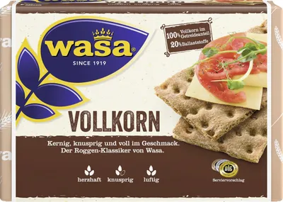 The image shows the packaging of Wasa Vollkorn Knäckebrot, with a close-up of the product topped with cheese and tomatoes.
