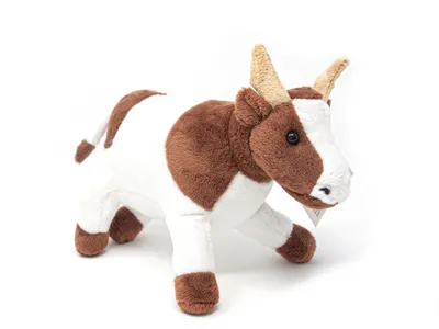 A plush toy cow with brown spots on a white background.