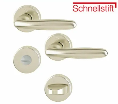 A set of door handles and escutcheons on a white background.