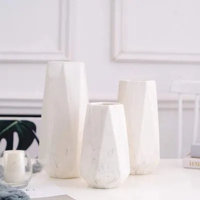 Image de Vase élégant au design raffiné, imitation marbre - Décoration pour salon