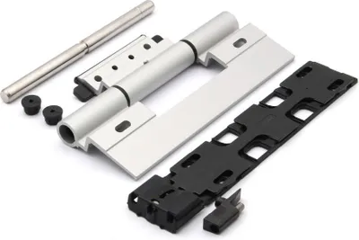 A collection of hardware components, including a hinge, a pin, and rubber pieces, laid out on a white background.