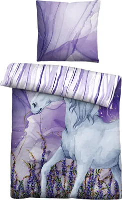 A duvet cover and pillowcase set with a unicorn and floral design.
