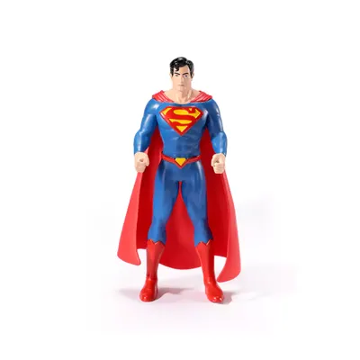 A full-body shot of a Superman action figure standing against a white background.