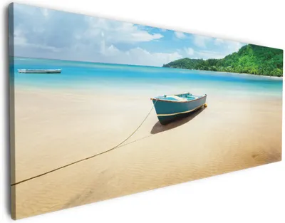 Produktbild von Wallario Premium Leinwandbild Urlaub am Palmenstrand unter Palmen mit Fischerboot in Größe 80 x 200 cm