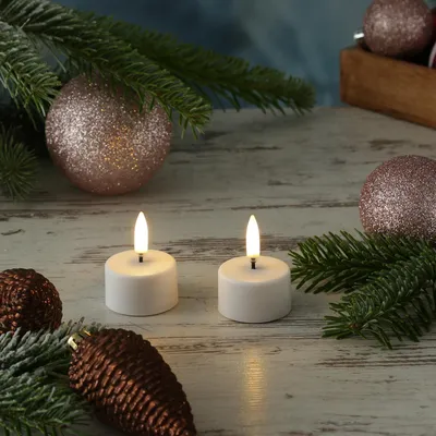 Produktbild von LED Mini Teelichter - 2 wiederaufladbare LED Teelichter - D: 4cm - Timer - weiß - für Außen