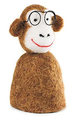 A felt monkey egg warmer with glasses and a smile, presented against a white background.