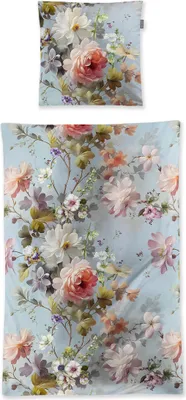 A flat lay image of a duvet cover and pillowcase set with a floral pattern.